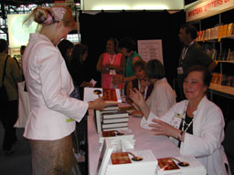 E.J. about to sign book