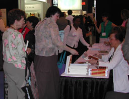 E.&nbsp;J. signs more books