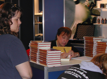 E.J. signing more books